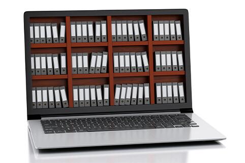 Laptop computer with image of books on the screen